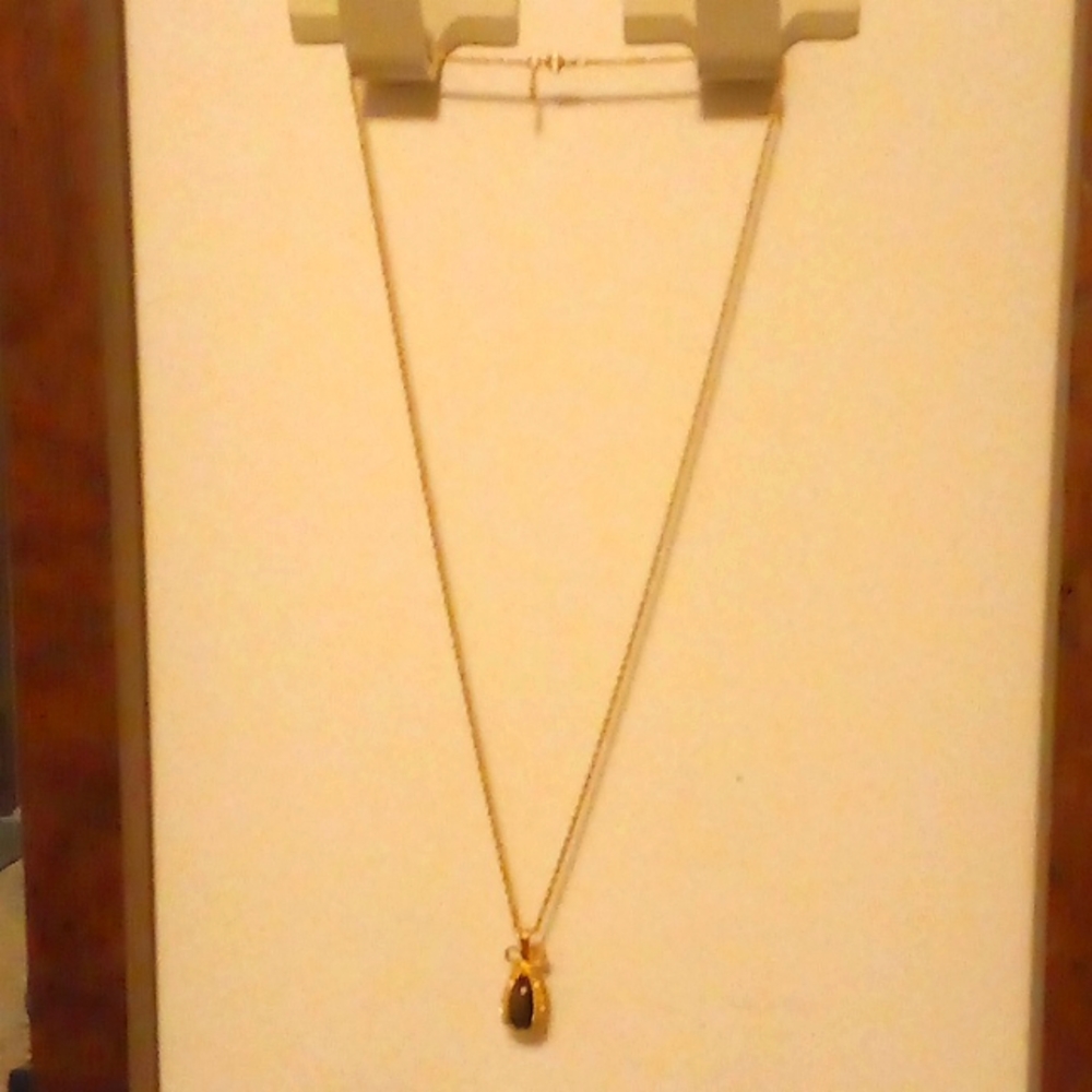 Beautiful Joan Rivers gold necklace with multi colored egg